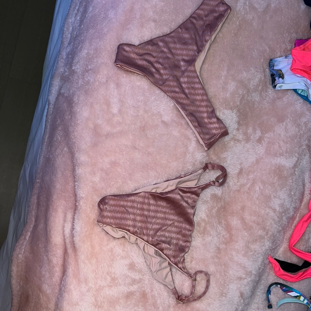 Pink brazillian bikini bottoms medium fits like a small never worn